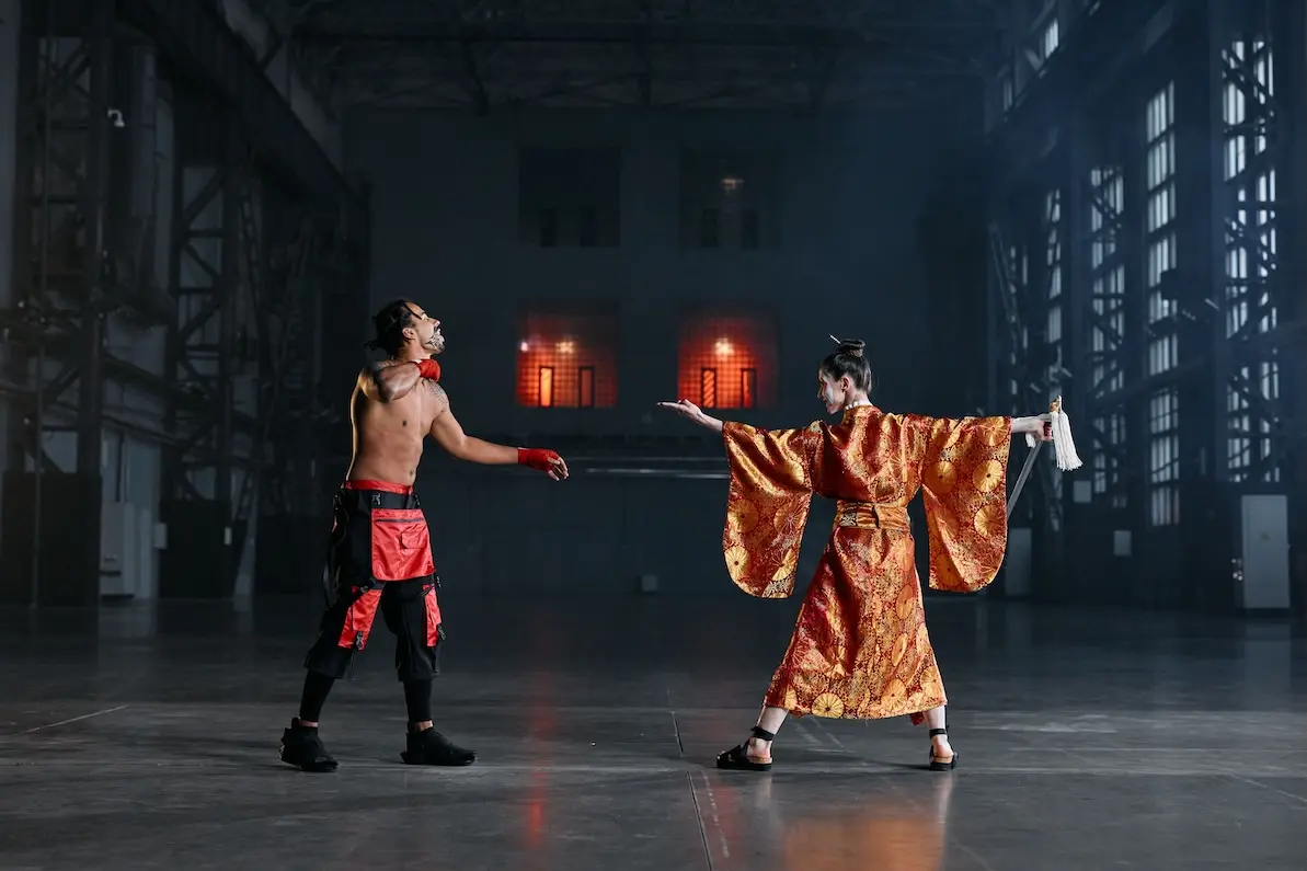 two actors in costume stage a fight for a photo shooting