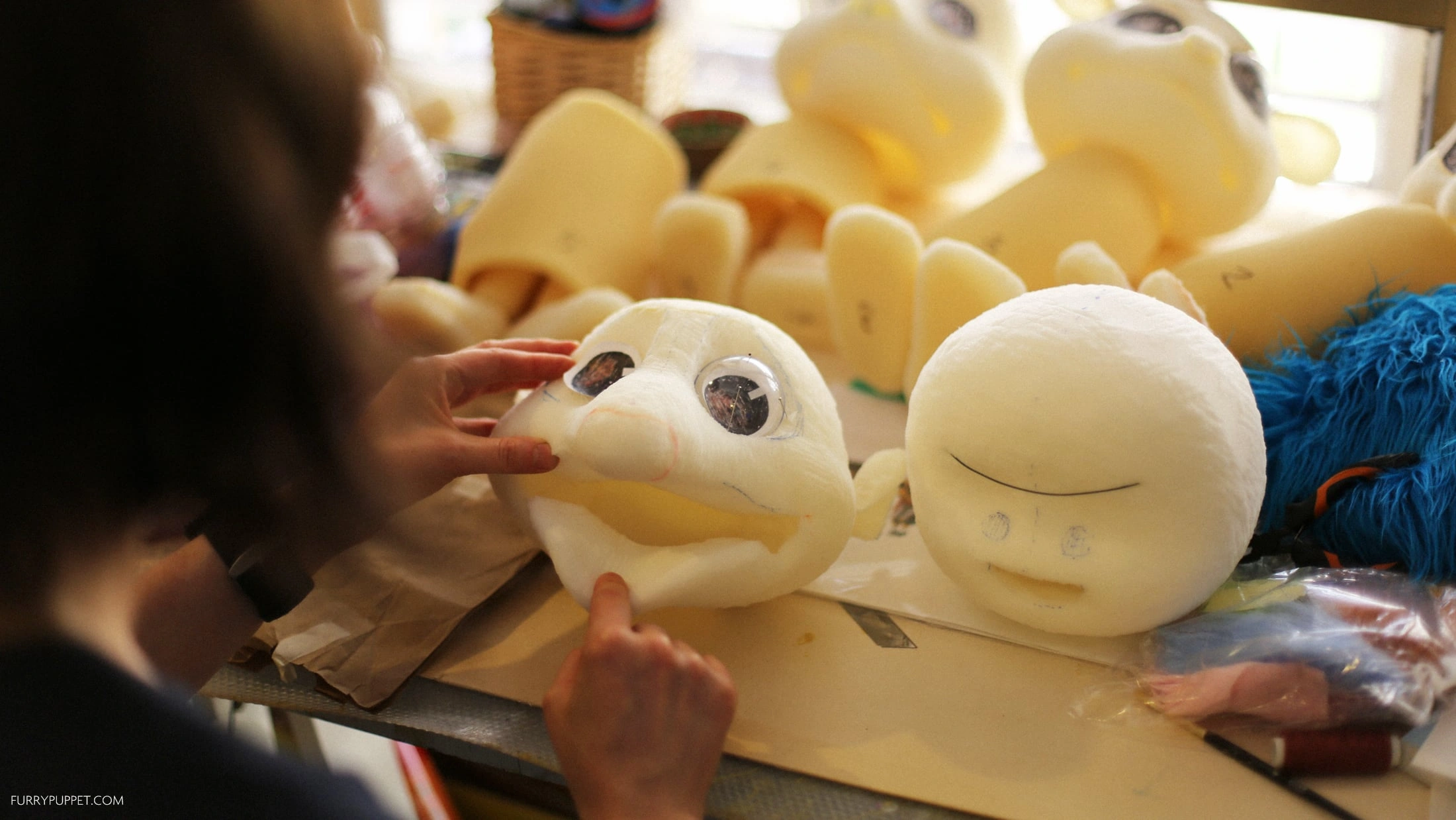Carved puppet head, source: Furry Puppet Studio.